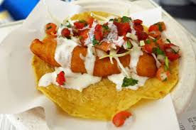 Grilled steak served with mexican rice and beans, sauteed onion, pepper, broccoli and two fresh flour tortillas with lettuce and tomato on the side. Los Mariscos Brings Bodacious Baja Fish Tacos To Chelsea Eater Ny