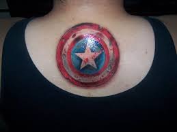 Temporary tattoos featuring the avengers!! Glowing Captain America Shield Tattoo On Back For Women Entertainmentmesh
