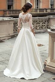 wedding dresses with a oned back