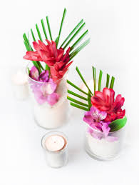 This tropical planter can be put together in about 20 minutes and makes a cute spring or summer centerpiece. Diy Tropical Flower Centerpieces Beacon Lane