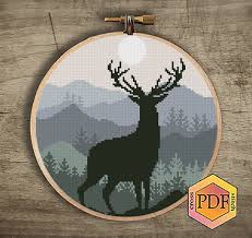 Buck deer counted cross stitch pattern by tereena clarke to download and print online. Silhouette Deer Modern Cross Stitch Pattern Pdf Landscape Etsy Cross Stitch Patterns Cross Stitch Modern Cross Stitch Patterns