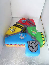 How To Make A Rainbow Birthday Cake Novelty Birthday Cakes Transformer Birthday Rescue Bots Birthday Party Transformers Birthday Cake Transformer rescue bots optimus prime & bumble bee created for twin boys turning 5. rescue bots birthday party