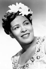 Lady Day Billie Holiday 🥀 Billie Holiday poses for a portrait in circa  1939 with a flower in her hair. Photo © Michael Ochs Archives/Getty Image