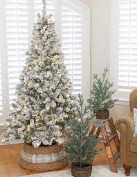 A simple tree skirt alternative. Best Christmas Tree Base Ideas To Dress Up Your Tree