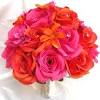 Orange and hot pink wedding bouquet of roses with lace details. 1