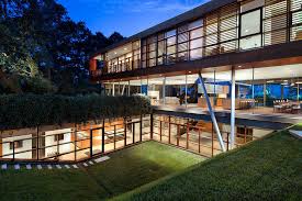 You can experience a seated tasting there. A Contemporary Glass House In A Wooded Austin Texas Suburb Mansion Global