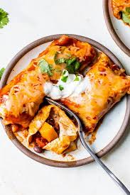 Vegetarian Enchiladas With Butternut Squash Black Beans Recipe In 2020 Vegetarian Enchiladas Skinny Taste Recipes Butternut Squash Black Bean