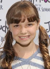 Use a cool hair accessory to fasten braids for kids into a cute little updo hairstyle. 50 Easy Wedding Hairstyles For Little Girls
