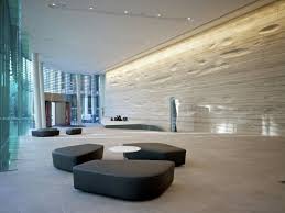 Sculpted Travertine Wall By Kohn Pedersen Fox Contemporist Interior Architecture Design Lobby Design Travertine