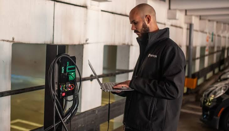 Assembly team building a vehicle access EV power station in Thamesmead SE28