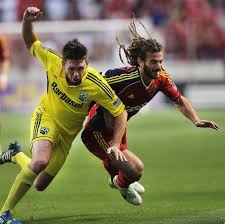 Columbus Danny O Rouke And Rsl S Kyle Beckerman Tumble To The Ground As They Chase Down A Ball As Real Salt Lake And The Columbus Crew Columbus Real Salt Lake