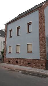 Kombination Zwischen Backsteinriemchen Und Mauerputz Fassade Klinker Fassade Haus Klinkerriemchen