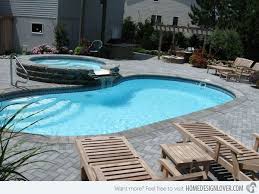 20 Exquisite Kidney Shaped Pool Designs Home Design Lover Kidney Shaped Pool Swimming Pool Designs Pool Landscaping