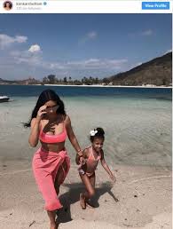 Kim kardashian west and kanye west coordinated halloween costumes with their four kids, dressing as characters from the flintstones. Kim Kardashian S Funny Yet Hot Pics See Her Jumping Off Yacht And Wearing Pink Bikini In Bali