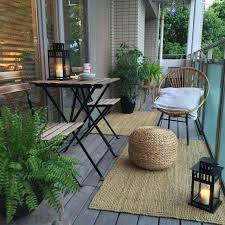 Landscape designers a blade of grass reconfigured the back porch to step down to an adjacent raised bluestone patio. 10 Stunning Small Apartment Balcony Ideas Decoratoo Apartment Balcony Decorating Small Apartment Balcony Ideas Apartment Patio Gardens