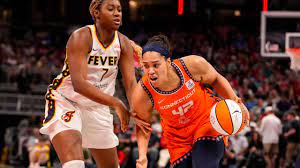 Caitlin Clark overcomes injury, but Harris shines late to give Sun 88-84  win over winless Fever
