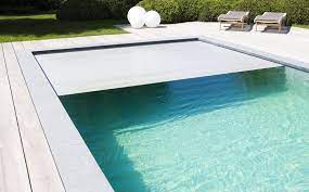 buitenzwembad met padoek terras skimmer zwembad liner de mooiste zwembaden droom zwembaden moderne zwembaden binnenzwembad