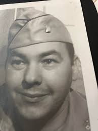 Can you identify the man in this WW2 photo?