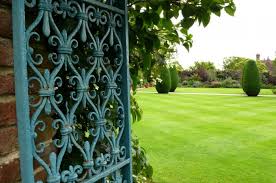 The family can't afford a new fence right, and they don't have much idea how to dress up a fence to however, as long as the wooden fence slats aren't actively splitting, then a lot of this gray color is at. Paint Colors For Iron Gates And Fences Gardenista