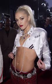 Gwen Stefani reflects on her pink hair and braces (and other classic looks)