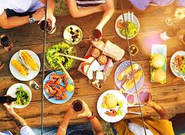 Big family dinner around table with food, many people eating a meal and talking together, happy cartoon characters during group lunch or celebration, isolated vector illustration on white background. 6 Recipes To Bring Family Dinner Back To The Table Success