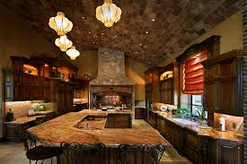 Natural elements and plenty of texture in cabinets, floors. Mediterranean Kitchen Kitchen Styles Updated Kitchen Kitchen Remodel Kitchen Design