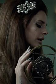 Lana Del Rey, the hair, the makeup, and the hair accessory is a my kinda  style.