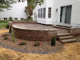 How to build a raised patio with retaining wall blocks. Retaining Walls Ajd Landscaping Collinsville Il