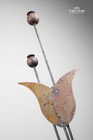 For speedy results, our large metal garden planters will make a dramatic statement in your garden. Handmade Metal Poppies And Tulips