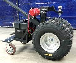 This tow dolly is painted flat black with custom 4 drop 3500 lb axle with electric brakes that comes with heavy duty ramps, safety chains, wheel net straps and led lights. High Quality Super Duty Powered Motorized Trailer Dolly 12 000lb Capacity