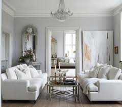 Why You Should Arrange Two Identical Sofas Opposite Of Each Other Designed Photo about living room with two oranfe modern sofa, the picture art on wall are my photo. why you should arrange two identical