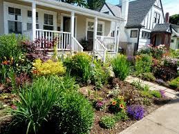 Journal garden design montreal perennial flower gardens. No Grass Front Yard There Were Surprises Up In The Trees In Many Gardens These Lanterns Front Yard Trees For Front Yard Yard Landscaping