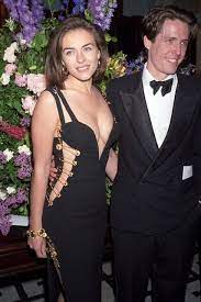 Elizabeth hurley wearing the iconic gianni versace safety pin dress, pic: The Most Expensive Dresses Of All Time Including Oscar Dresses Bespoke Wedding Gown Expensive Dresses Dresses