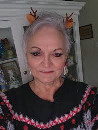 What are some ideas for a new hairstyle, should I get a pixie cut or let my  hair grow out?