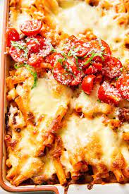 Ziti Pasta Swimming In Delicious Meat Sauce Flavoured With Garlic And Basil Then Topped With Mozzarella And Baked To G In 2020 Baked Ziti Ziti Recipes Easy Baked Ziti