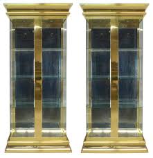 Valencia curio cabinet is rated 4.7 out of 5 by 34. Sold Price Pair Ello Brass Curio Cabinets December 5 0117 11 00 Am Est