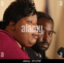 Julia Hudson, sister of actress Jennifer Hudson, left, and Greg King plead  for the safe return of their son Julian King who was abducted from the  Hudson family home where the sisters'