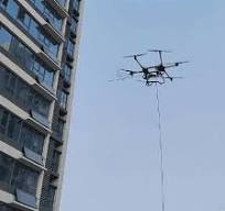 Cleaning of High-Rise Building with a Drone, Environment Friendly to Save  Water and Cleaning Agent, Usefull Cleaning Drone with 100m Water Hose ...