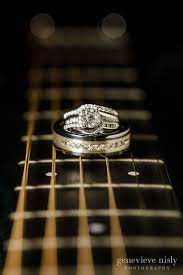 Perfect Wedding Ring Photos For A Couple Of Musicians On The Groom S Martin Guitar Photo By Geneviev Wedding Rings Photos Wedding Ring Photography Ring Photos
