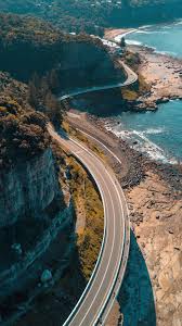 Sea Cliff Bridge Aerial View Highway 1080 X 1920 Wallpapers Available For Free Download Oceania Travel Australia Travel Cool Places To Visit