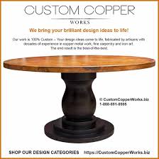 Round Copper Top Dining Table Mounted On The Anna Wood Pedestal Table Base Copper Top Table Wood Pedestal Dining Table