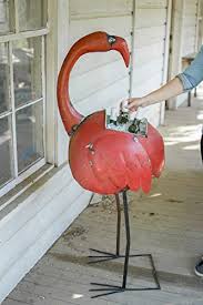 This is a fantastic planter for the garden. Kalalou Red Reclaimed Metal Flamingo Cooler Of Planter One Size Pink Buy Online In Antigua And Barbuda At Antigua Desertcart Com Productid 37766757