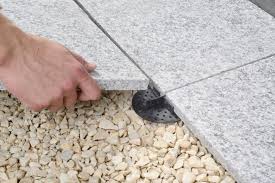 This can be done using a metal tamper, your feet or any other tool like a piece of wood to firm it down. Paving Supports For Patio Slabs 2 Mm Dd Pedestals