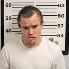 Two charged with breaking into McNeely's