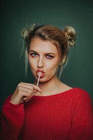 Portrait Of Girl With Lollipop In Studio Portrait Photography Women Portrait Girl Studio Photography Poses