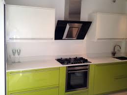 Using worktop offcuts to perfectly fit the windowsill. Ex Display High Gloss Apple Green Rational Cambia Kitchen With Silestone Worktops