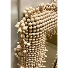 Currey & Co. Modern Beige Wooden Bead Jeanie Wall Mirror