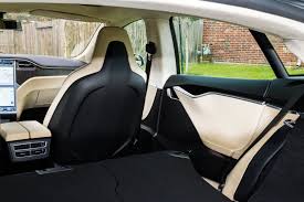 Elsewhere, oddments storage is plentiful and a combined luggage space of 542 litres (split between a small compartment at the front and a traditional rear boot) is certainly usable enough and more than the 480 litres you get. Review Tesla Motors All Electric Model S Is Fast But Is It A Good Car Ars Technica