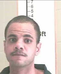 MUGSHOT: Christopher Napoleon Barrett II, 35, was transported back from  McMinn County, Tennessee, and booked into the Whitfield County Jail  Thursday, charged by the GBI with murder- non-family (gun), theft by taking