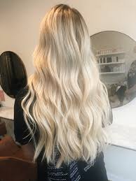 A beautful warm brown at the roots gently lightens into a lighter golden shade at the ends. Creamy Long Blonde Hair Blonde Hair Looks Light Blonde Hair Hair Styles